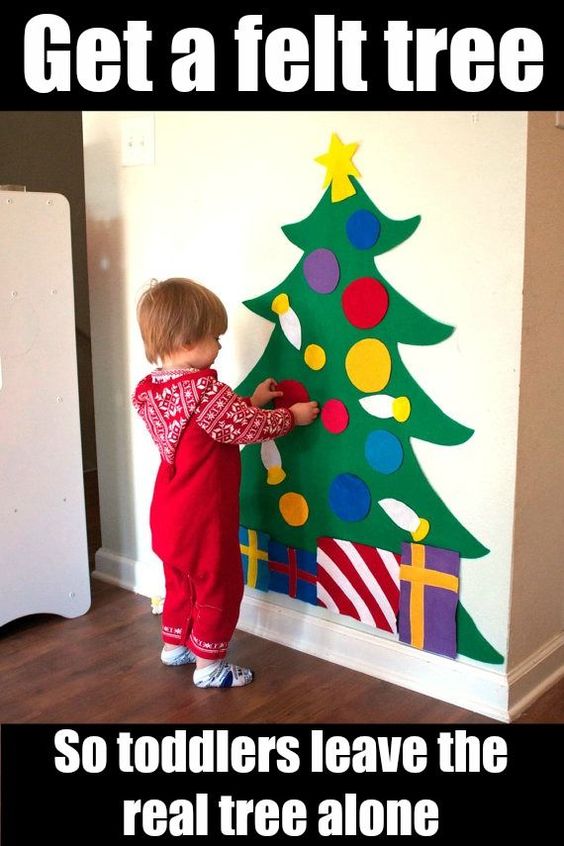 This is brilliant! Get a felt Christmas tree for the wall so the kids can play with that instead of messing with the real tree. Smart solutions for Christmas with toddlers. (ad)